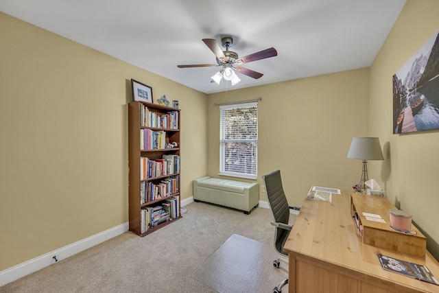 carpeted office with ceiling fan