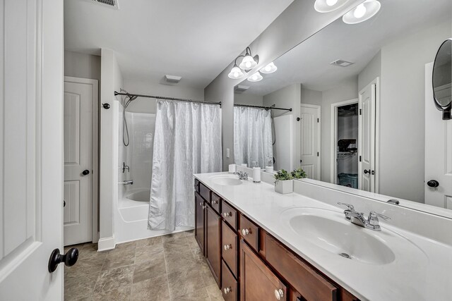 bathroom with vanity and shower / bathtub combination with curtain