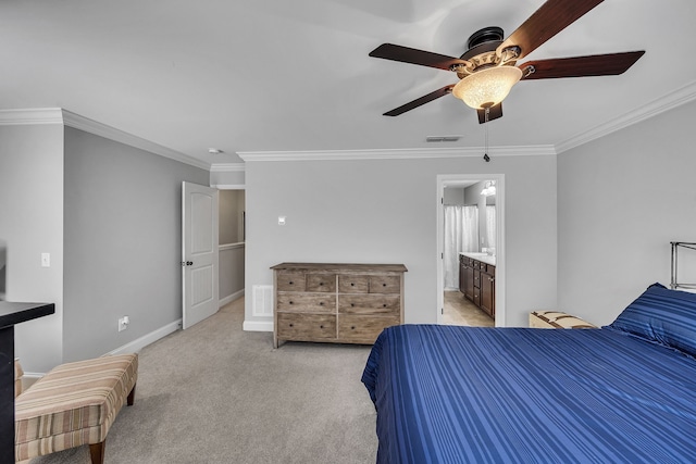 bedroom with ceiling fan, ensuite bathroom, ornamental molding, and light carpet