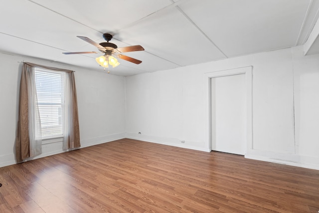 unfurnished room featuring wood-type flooring and ceiling fan