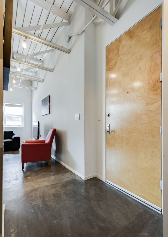 interior space featuring vaulted ceiling