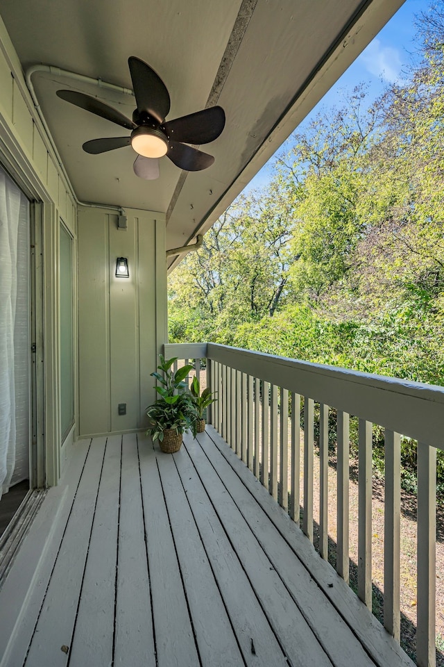 wooden deck with ceiling fan