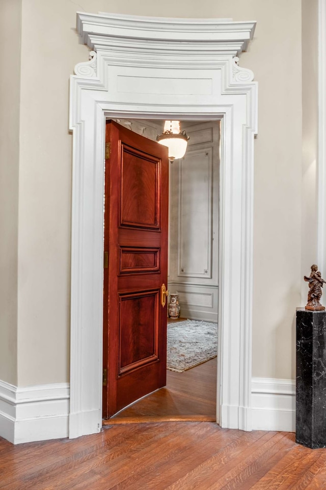 corridor featuring hardwood / wood-style flooring