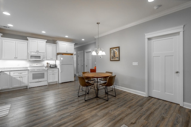 dining room featuring crown molding, dark hardwood / wood-style flooring, and an inviting chandelier