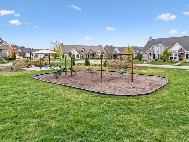 view of playground featuring a lawn