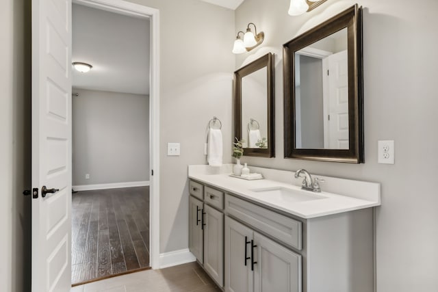 bathroom featuring vanity and hardwood / wood-style floors