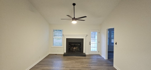 unfurnished living room featuring dark hardwood / wood-style flooring, high vaulted ceiling, and ceiling fan