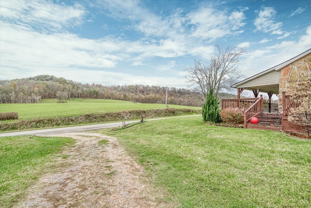 view of yard with a deck