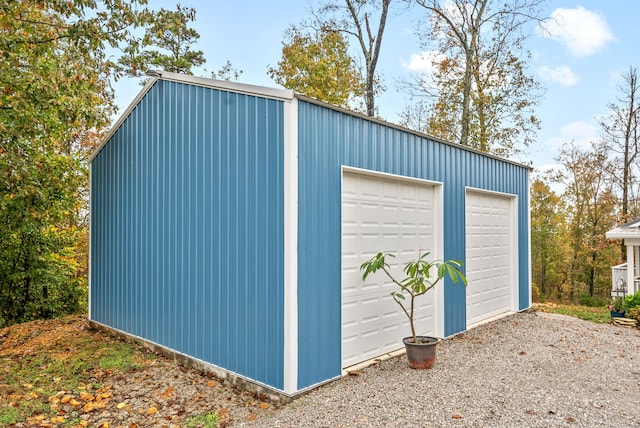 view of outbuilding with a garage