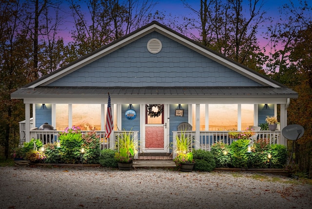 bungalow-style home with a porch