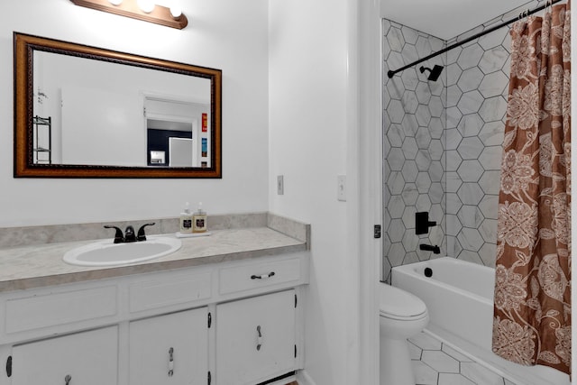 full bathroom featuring tile patterned floors, vanity, toilet, and shower / bathtub combination with curtain