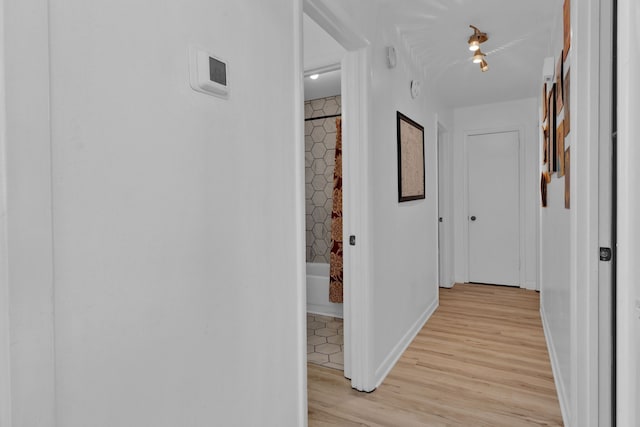 corridor featuring light wood-type flooring