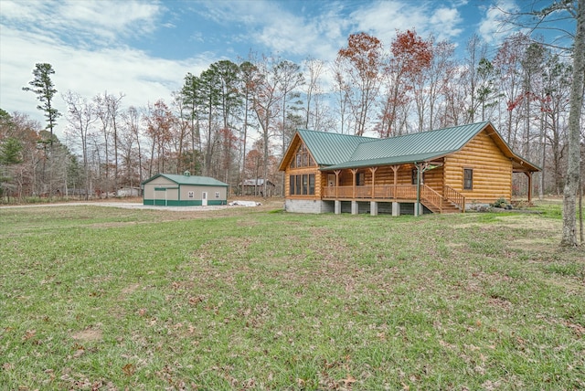 exterior space featuring a yard and a porch