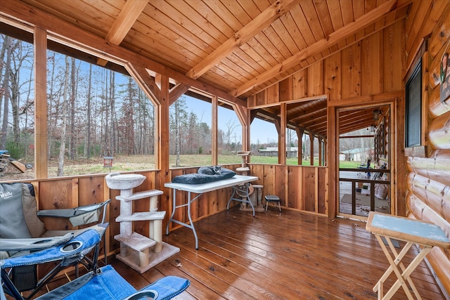 sunroom with vaulted ceiling with beams and wood ceiling