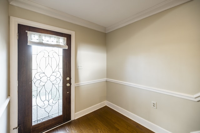 foyer entrance featuring dark wood-type flooring and ornamental molding