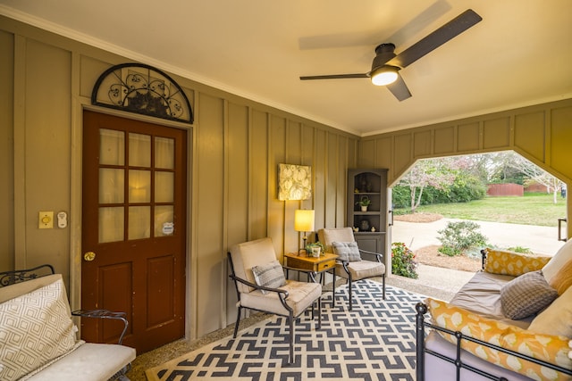 exterior space featuring ceiling fan and crown molding