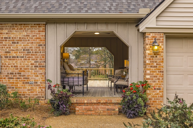 property entrance with a garage and covered porch