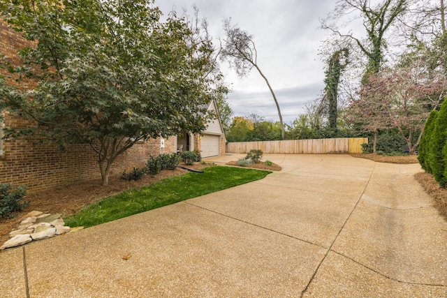 view of patio / terrace featuring a garage