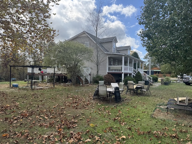 exterior space featuring a sunroom and a deck