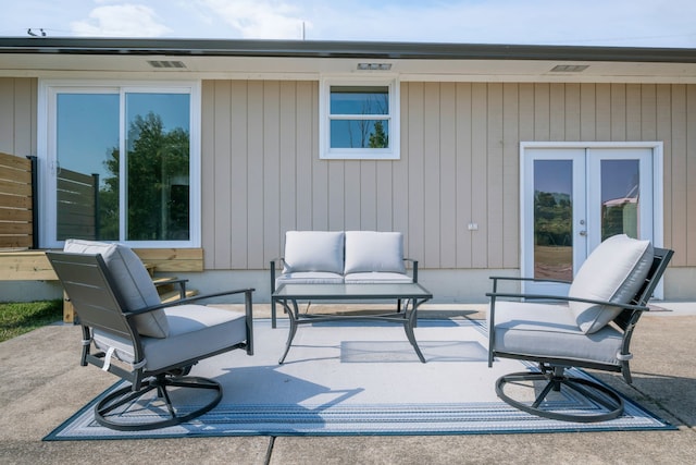 view of patio with french doors and an outdoor hangout area