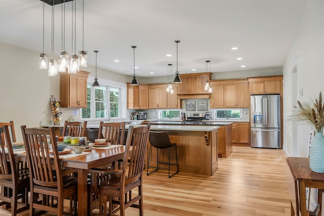 dining room featuring light hardwood / wood-style flooring