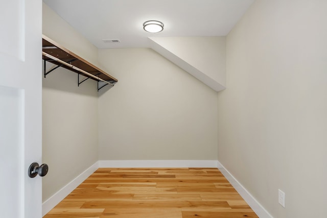 spacious closet with wood-type flooring