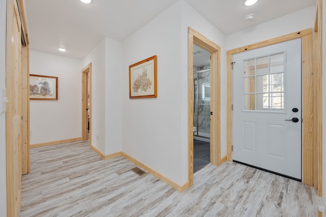 entrance foyer featuring light hardwood / wood-style floors