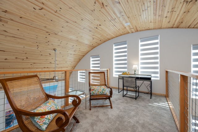 living area with wooden ceiling, light carpet, and vaulted ceiling