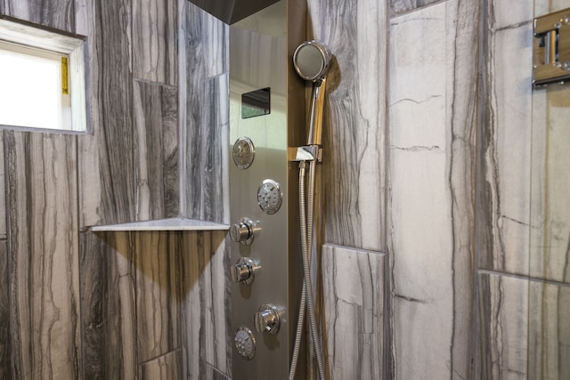 bathroom featuring a shower