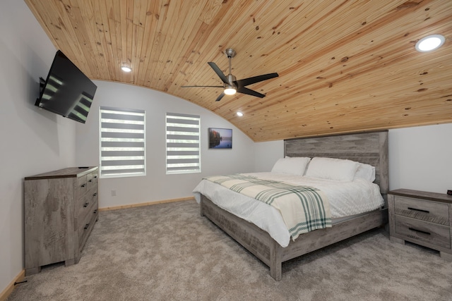 bedroom with ceiling fan, wood ceiling, light carpet, and vaulted ceiling