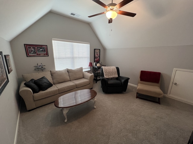 carpeted living room featuring vaulted ceiling and ceiling fan