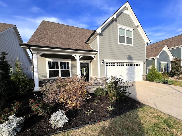 view of front of property featuring a garage