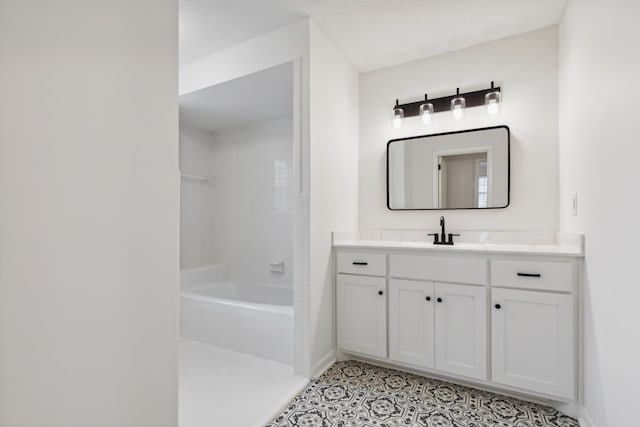 bathroom featuring vanity and shower with separate bathtub