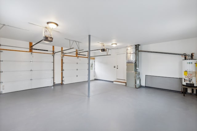 garage with water heater and a garage door opener