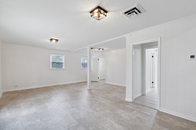 interior space featuring a textured ceiling