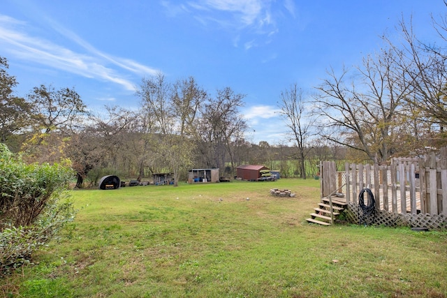 view of yard with a wooden deck