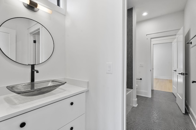 bathroom featuring vanity and bathtub / shower combination