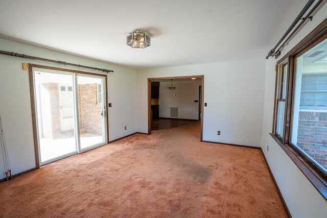 view of carpeted spare room