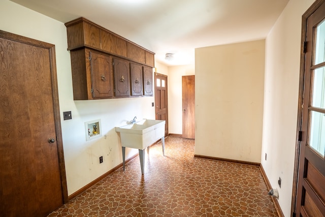 laundry area with cabinets and washer hookup