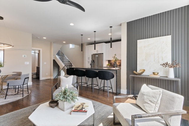 living room with dark wood-type flooring