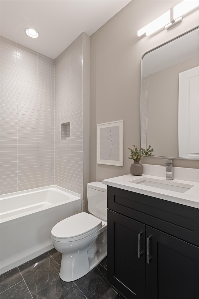 full bathroom featuring vanity, toilet, and bathing tub / shower combination