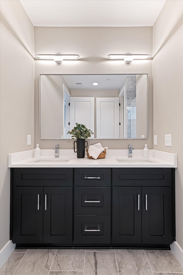 bathroom featuring vanity