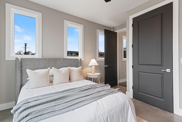 bedroom featuring multiple windows