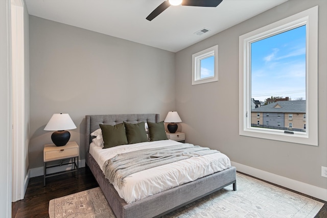 bedroom featuring hardwood / wood-style floors and ceiling fan