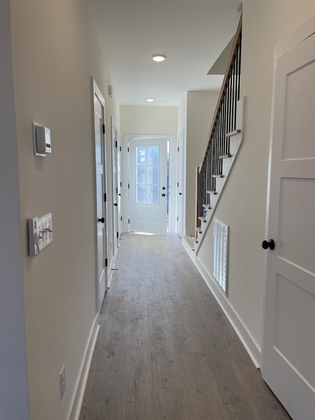 hall featuring hardwood / wood-style floors