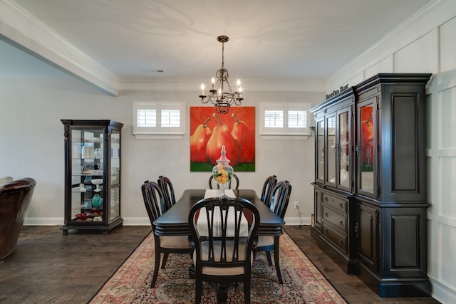 dining area featuring dark hardwood / wood-style flooring, crown molding, a wealth of natural light, and an inviting chandelier