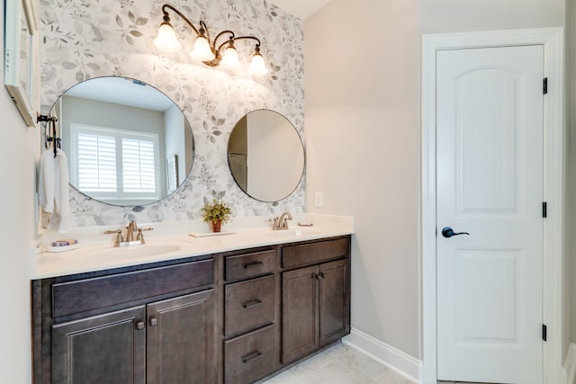 bathroom with vanity and tile patterned floors