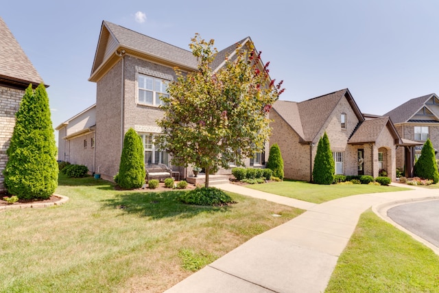 view of front of home featuring a front lawn