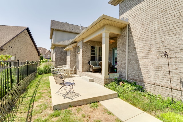 back of house with a patio