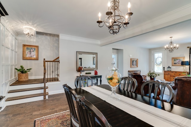 dining room featuring a chandelier, dark wood-type flooring, and ornamental molding